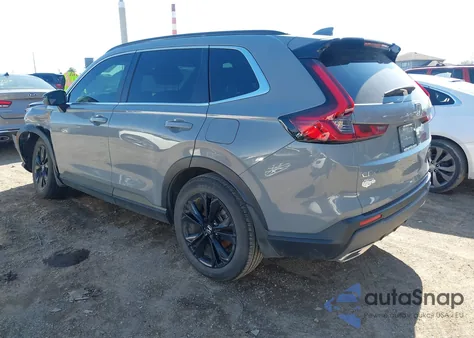 2023 Honda Cr-V Hybrid Sport Touring z USA, uszkodzony, nr VIN 2HKRS6H96PH811113